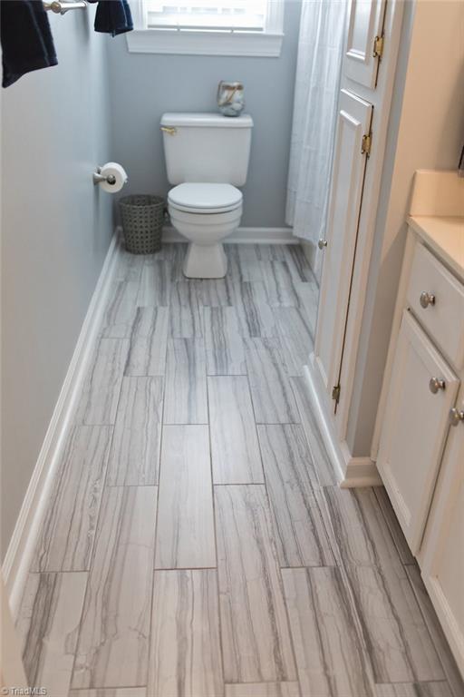 1507 Heathcliff Road High Point, NC 27262 - Photo 17 of 30 New Tile in Guest Bathroom with 2 Large Built In Cabinets Plus Drawers & 3 More Cabinets. So Much Storage!