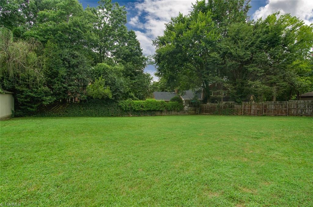1507 Heathcliff Road High Point, NC 27262 - Photo 3 of 30 Huge, flat and fenced! This backyard is perfect for pets, children and entertaining!