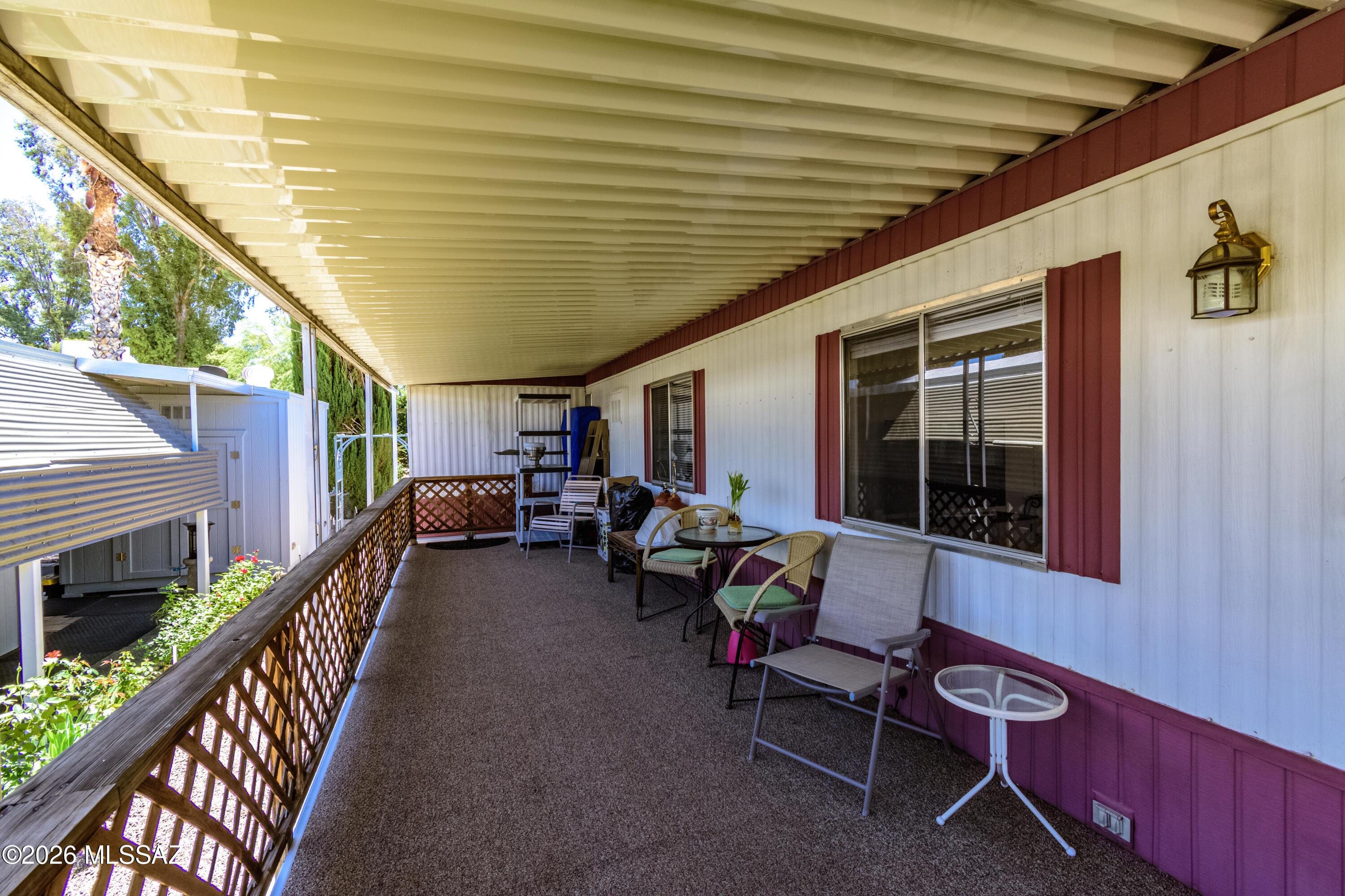 4550 North Flowing Wells Road, Unit 155 Tucson, AZ 85705 - Photo 6 of 40 a view of a deck with seating space