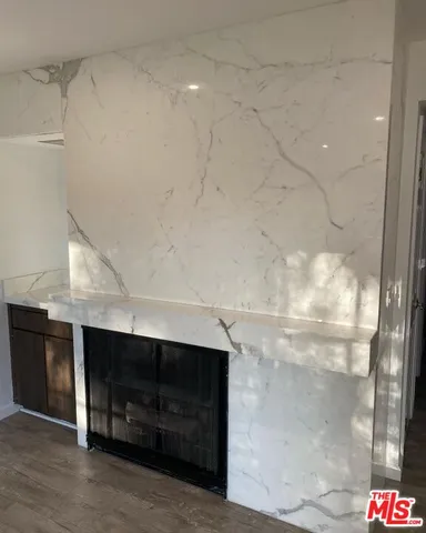 a room with a cabinet and storage space