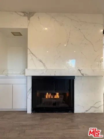 a living room with a fireplace