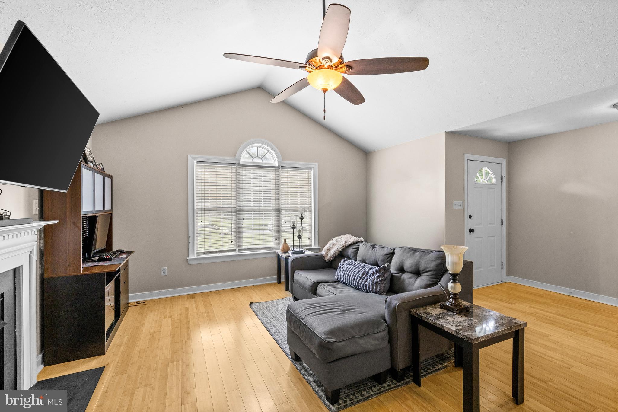 151 Deep Landing Road Tappahannock, VA 22560 - Photo 7 of 31 Family room with hardwood floors