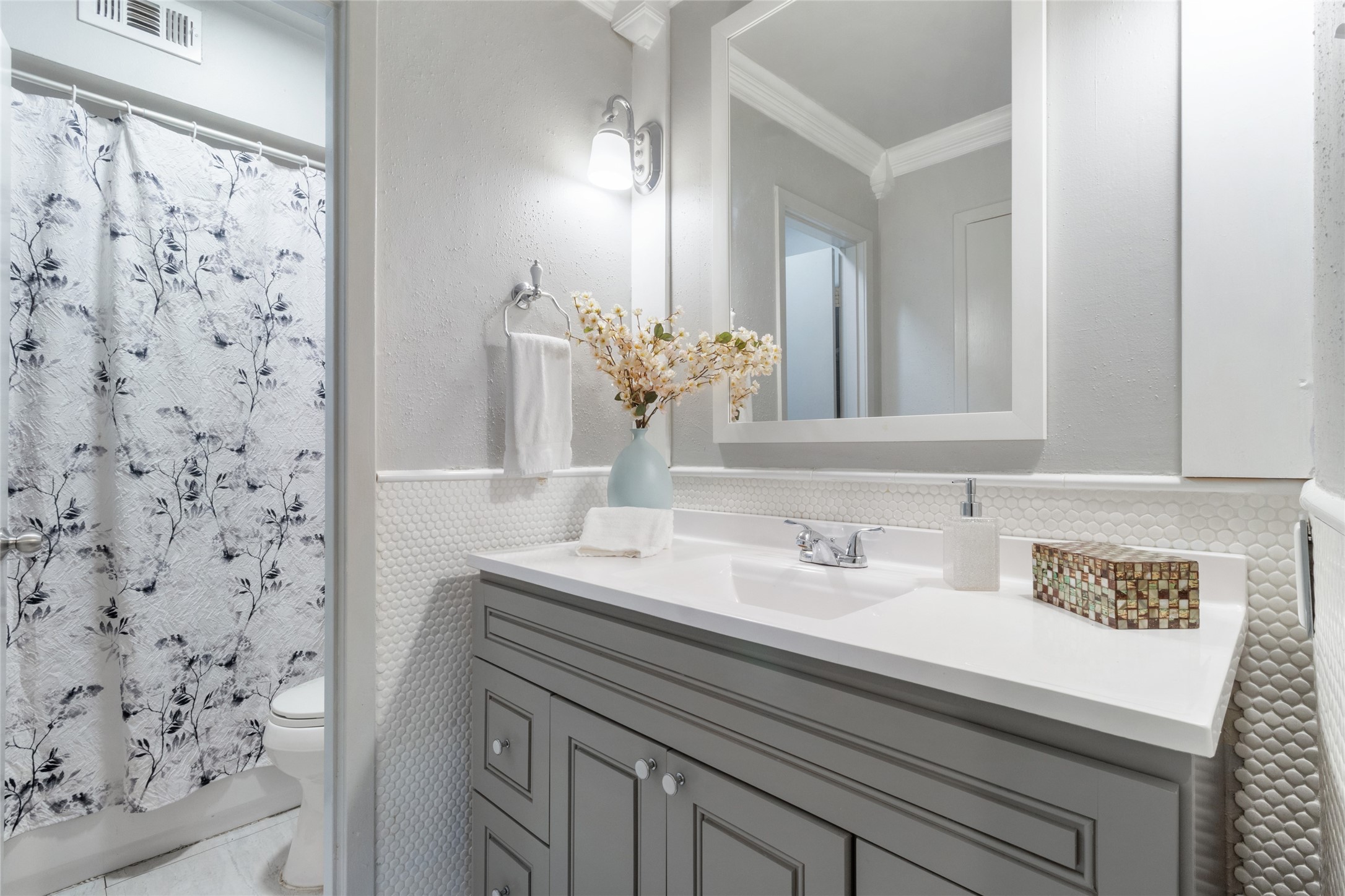 3924 West Alabama Street, Unit 4 Houston, TX 77027 - Photo 15 of 32 Primary Suite bathroom that has been updated. Shower and toliet is separate from the vanity making it easy for two people to get ready at same time!