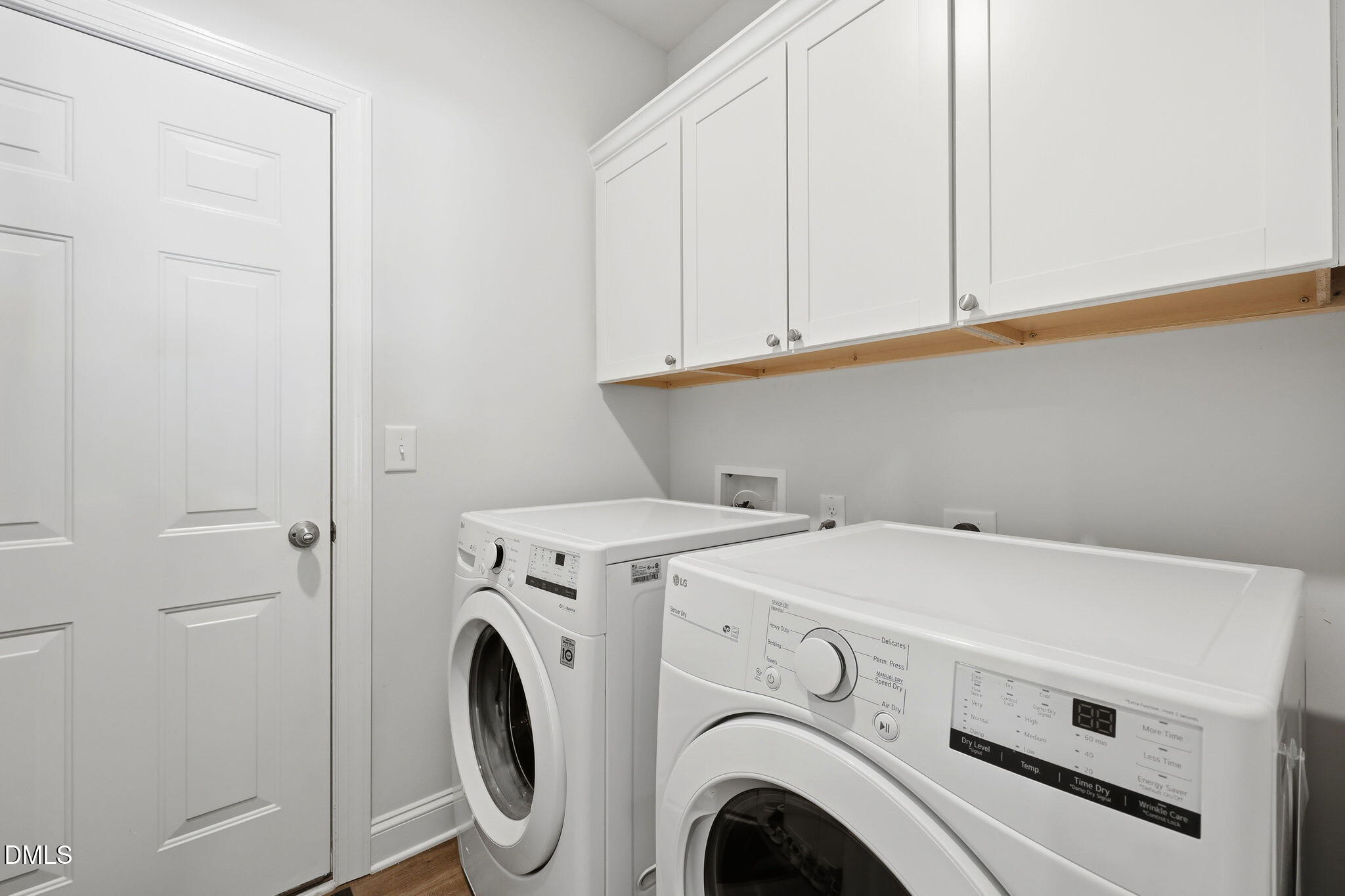 7012 Vanover Drive Raleigh, NC 27604 - Photo 28 of 41 Laundry Room with Cabinet Storage