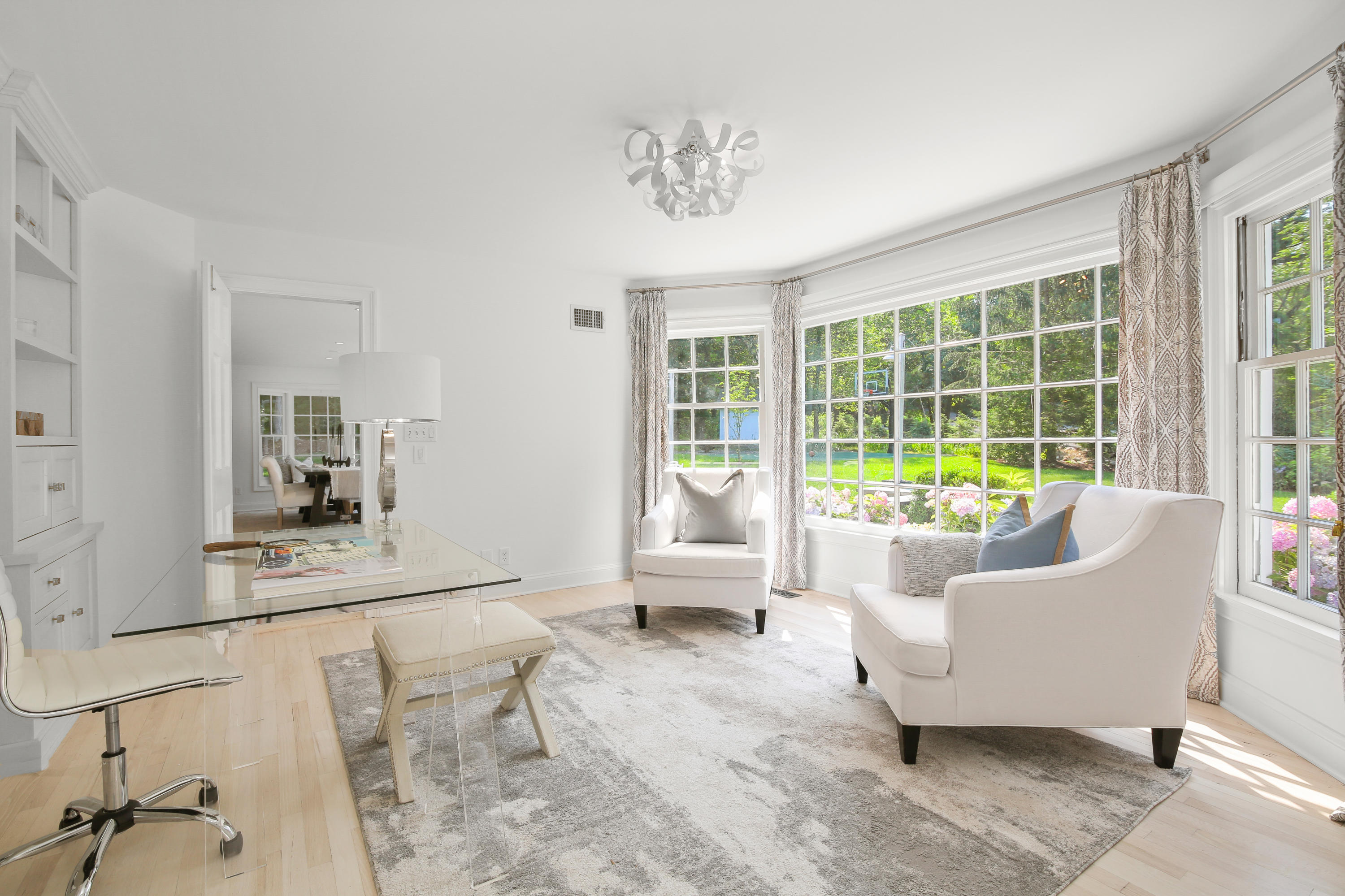 114 Colony Road Darien, CT 06820 - Photo 13 of 40 a living room with furniture and a large window
