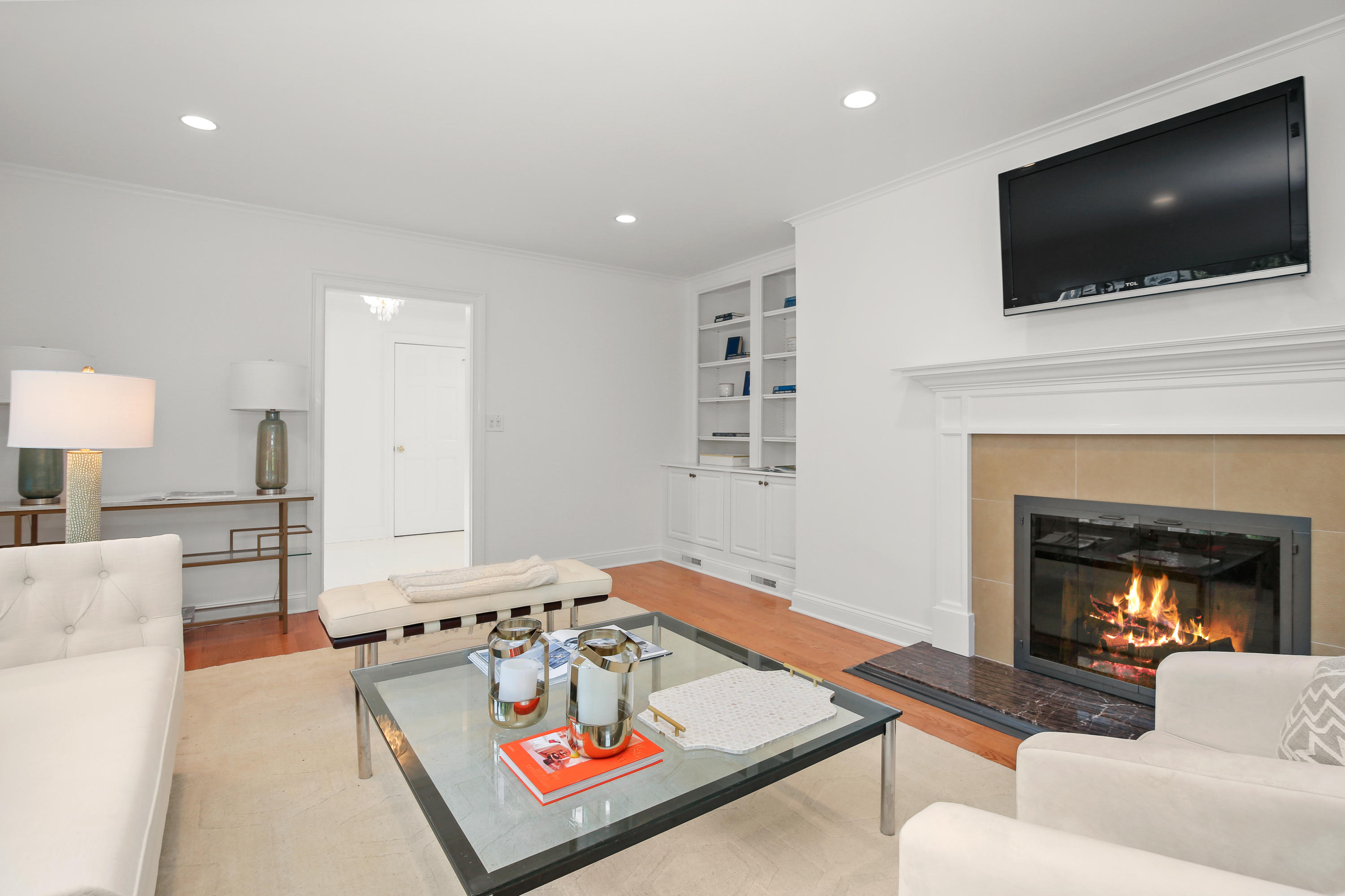 114 Colony Road Darien, CT 06820 - Photo 14 of 40 a living room with furniture and a flat screen tv