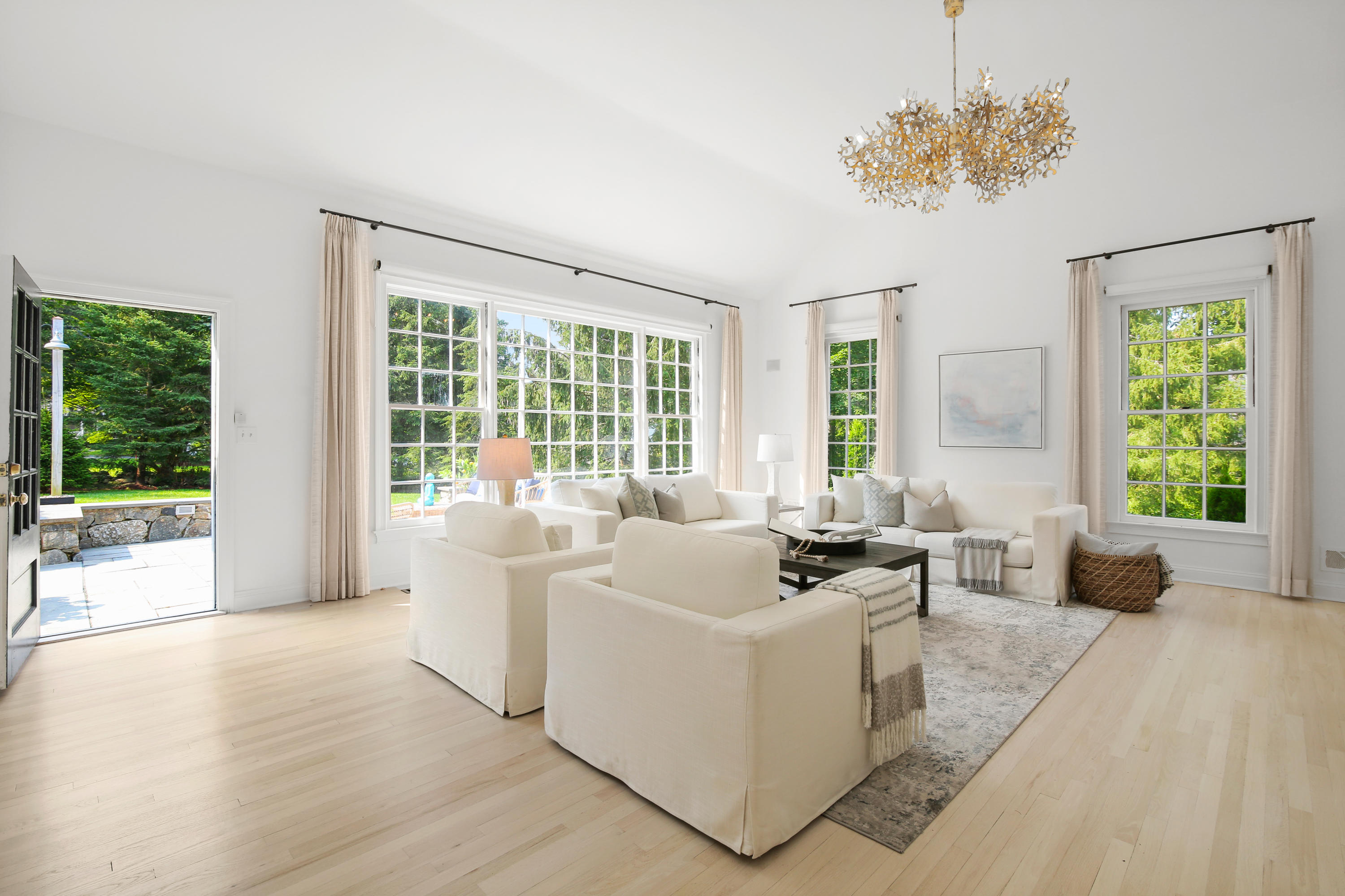 114 Colony Road Darien, CT 06820 - Photo 3 of 40 a living room with furniture and large windows