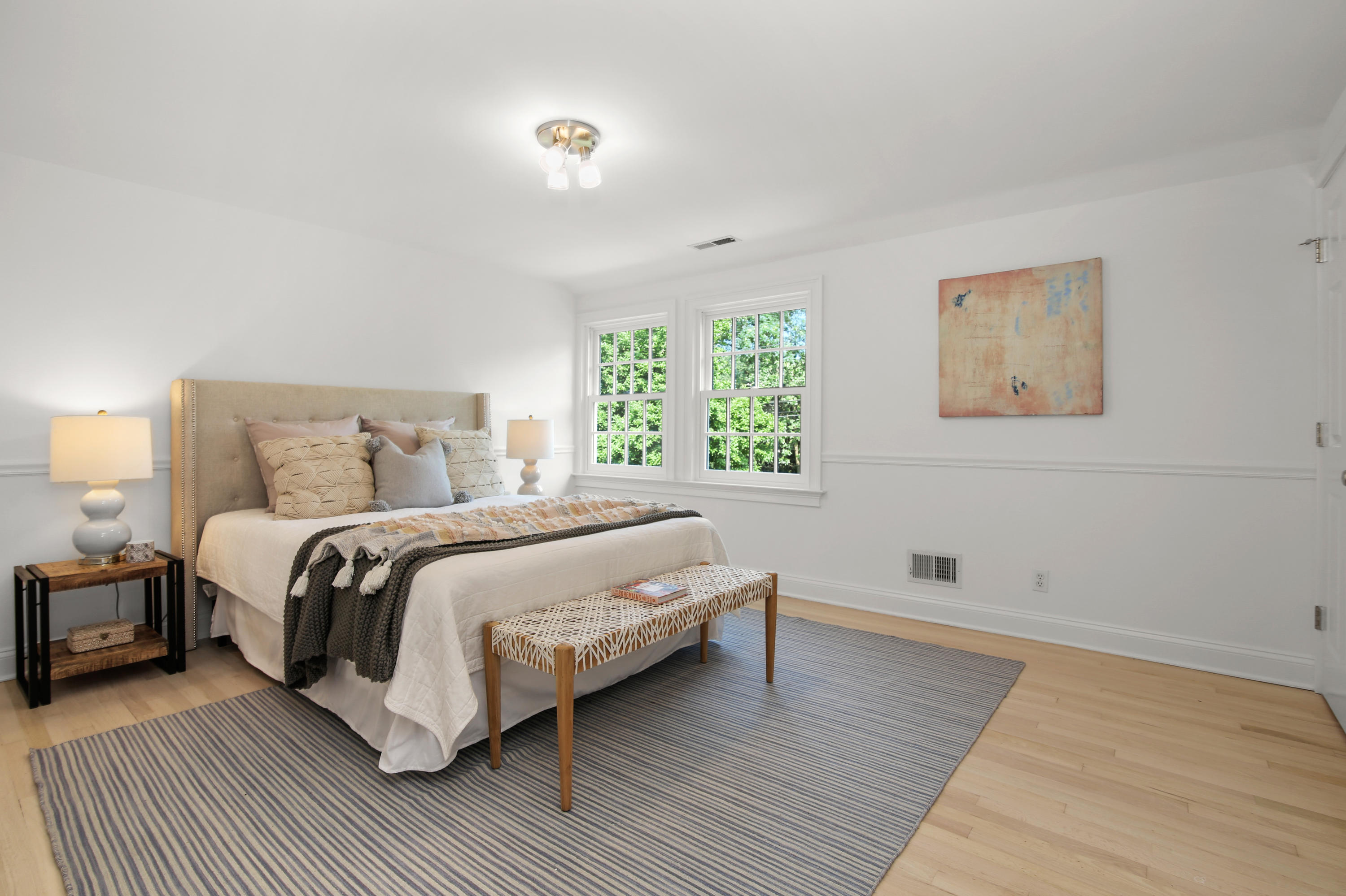 114 Colony Road Darien, CT 06820 - Photo 24 of 40 a bedroom with a bed and a large window