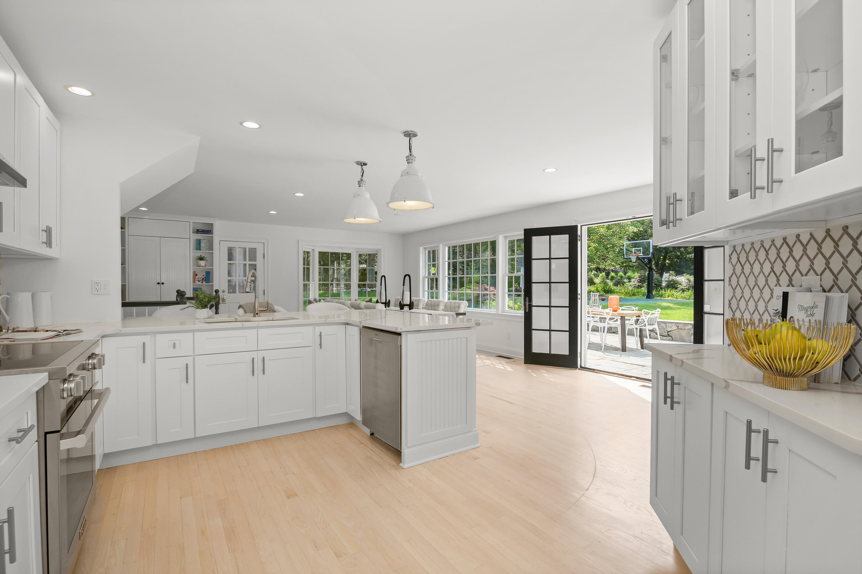 114 Colony Road Darien, CT 06820 - Photo 4 of 40 a large white kitchen with a large window