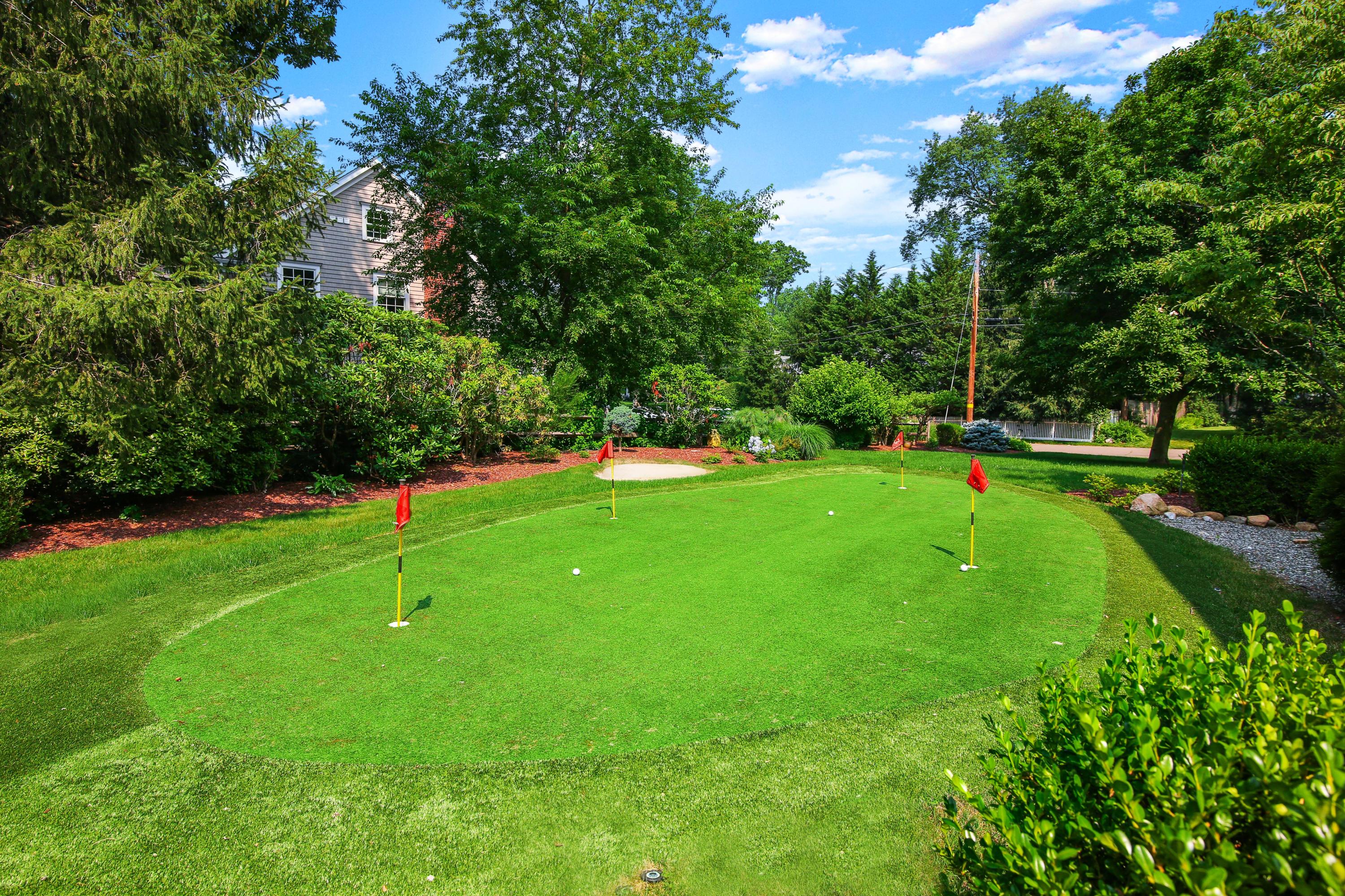 114 Colony Road Darien, CT 06820 - Photo 35 of 40 a view of green field with trees in the background