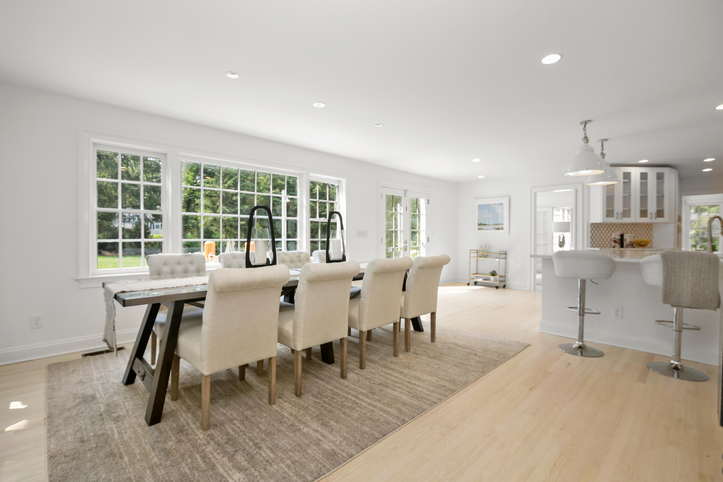 114 Colony Road Darien, CT 06820 - Photo 8 of 40 a view of a dining room with furniture and a large window