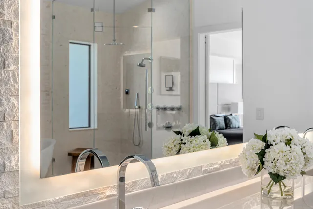 a balcony with furniture and wooden floor