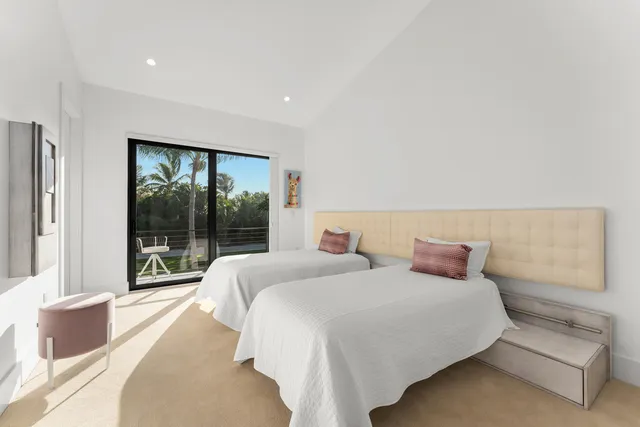 a view of a lake with a building in the background