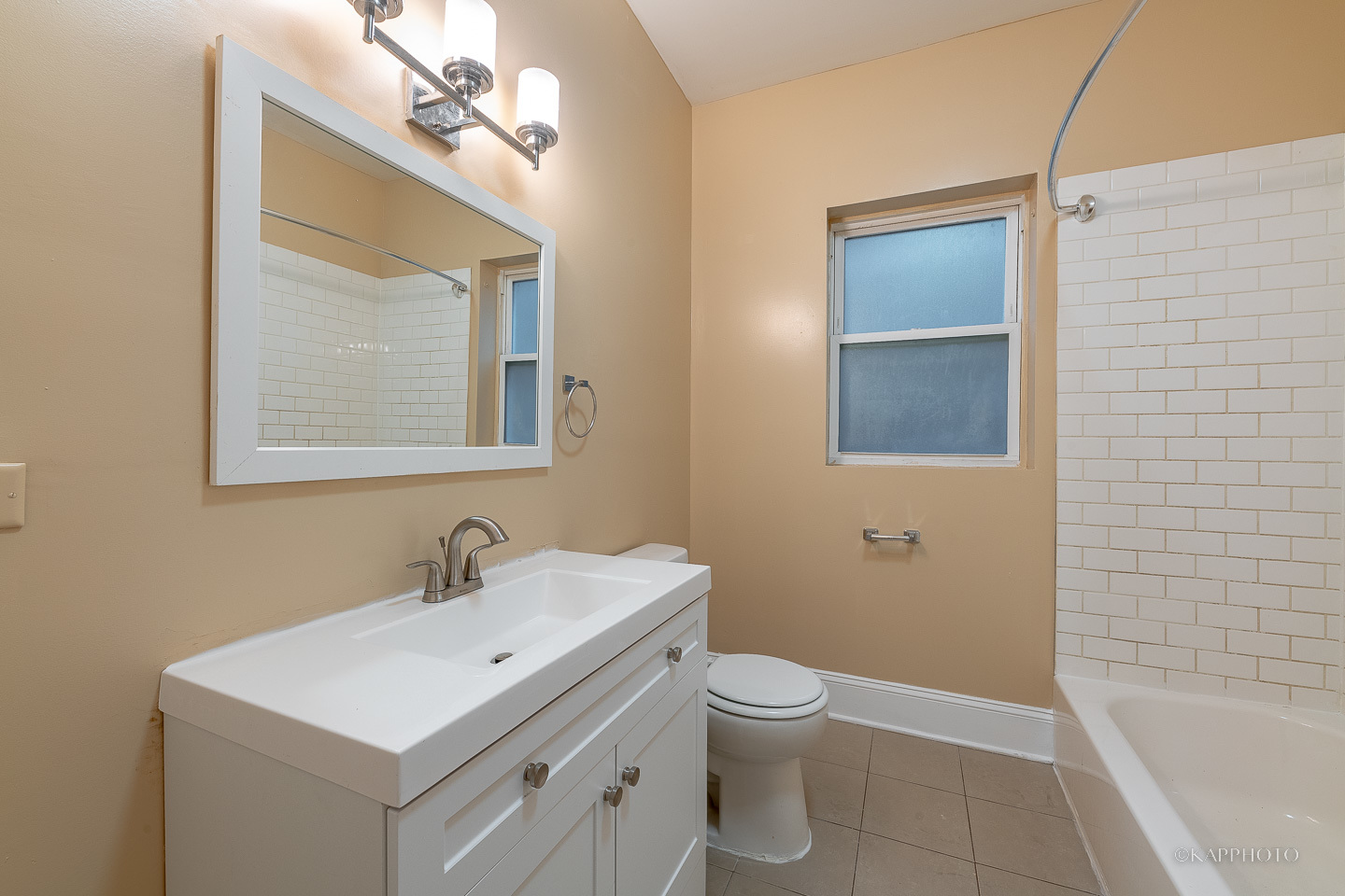 6819 South Ridgeland Avenue, Unit 2 Chicago, IL 60649 - Photo 21 of 27 a bathroom with a sink toilet and shower