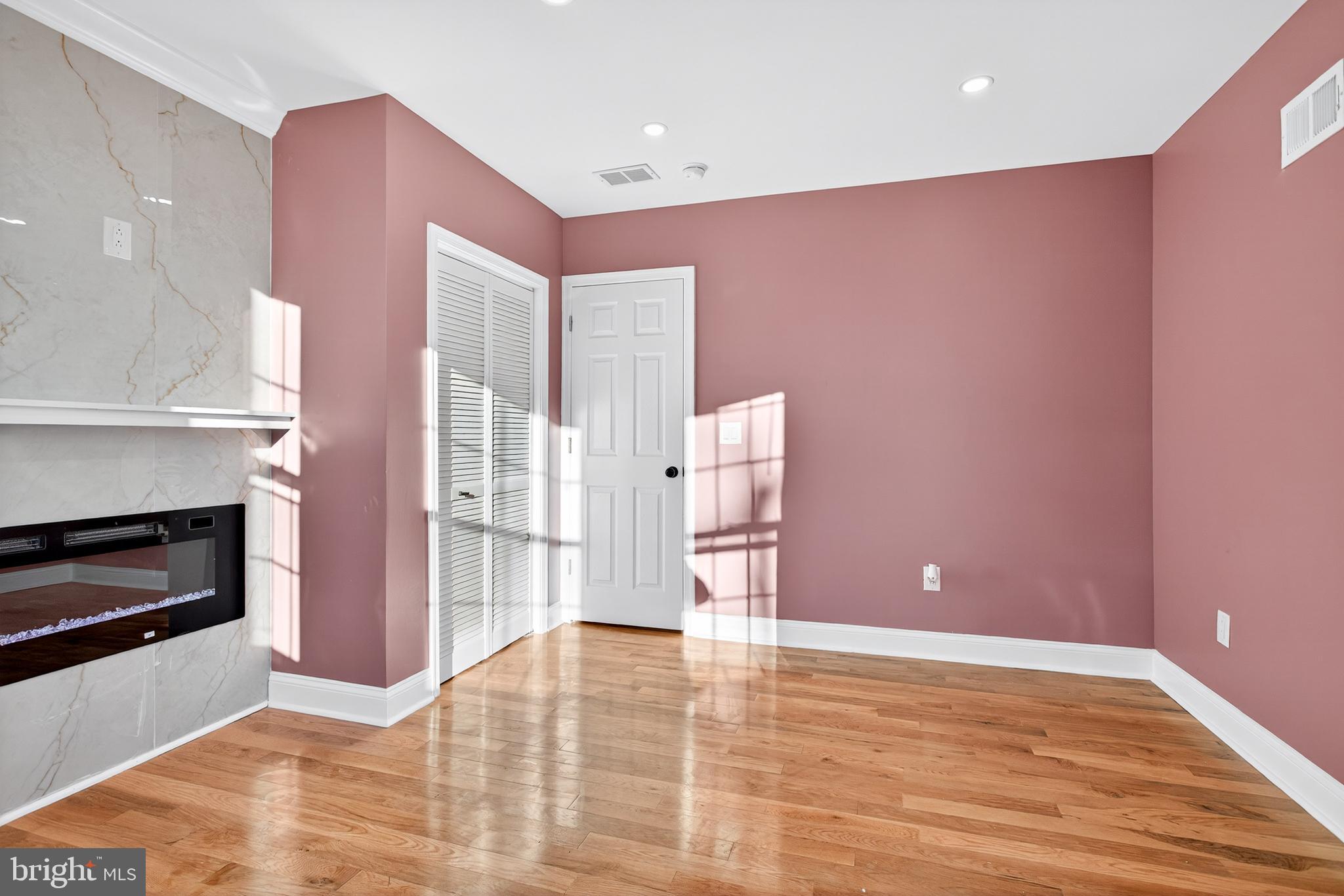 5421 Kingsessing Avenue Philadelphia, PA 19143 - Photo 22 of 39 a view of an empty room with window and fire place