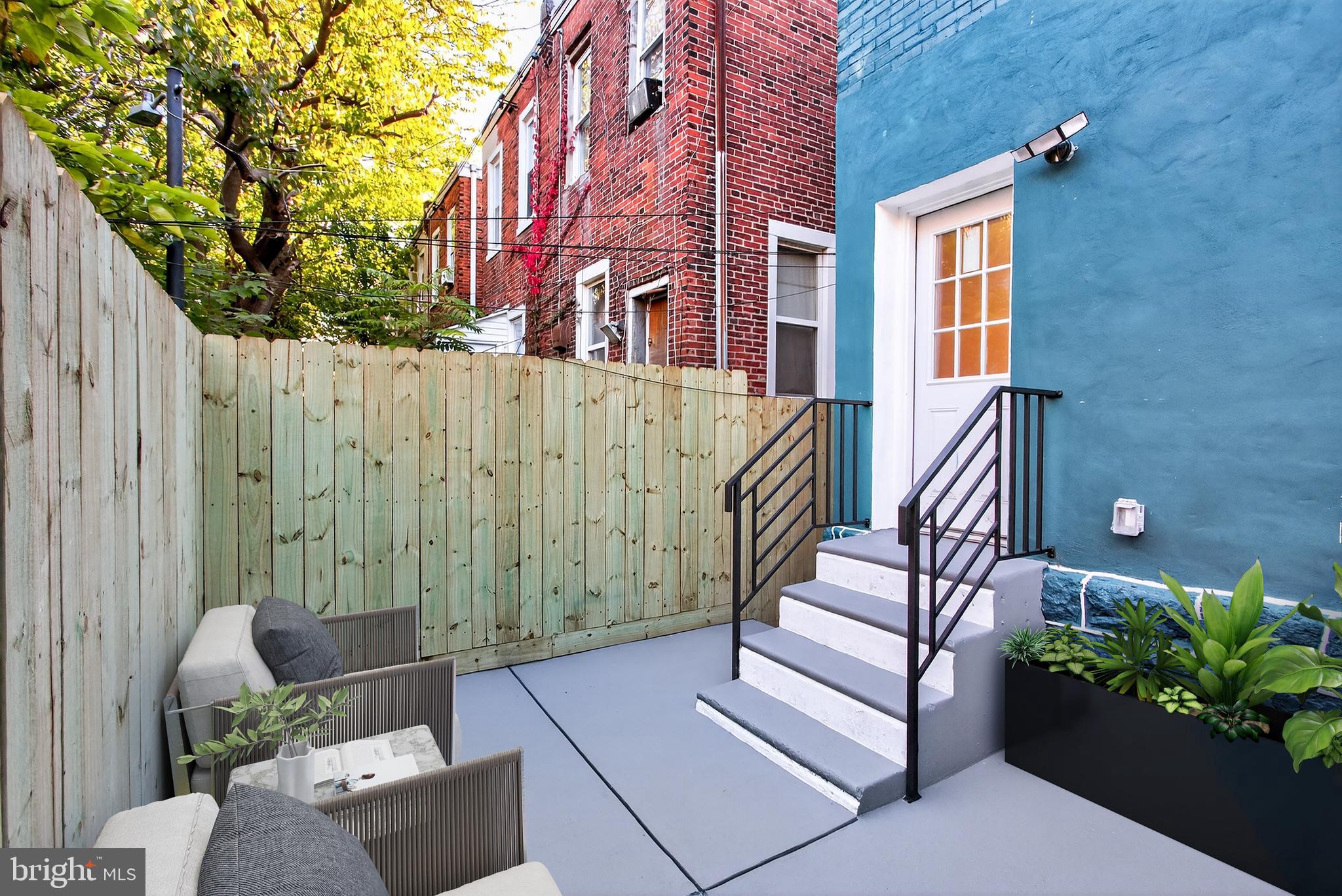 5421 Kingsessing Avenue Philadelphia, PA 19143 - Photo 4 of 39 a view of a patio with couches and potted plants