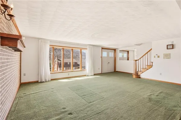 a view of a room with an empty space