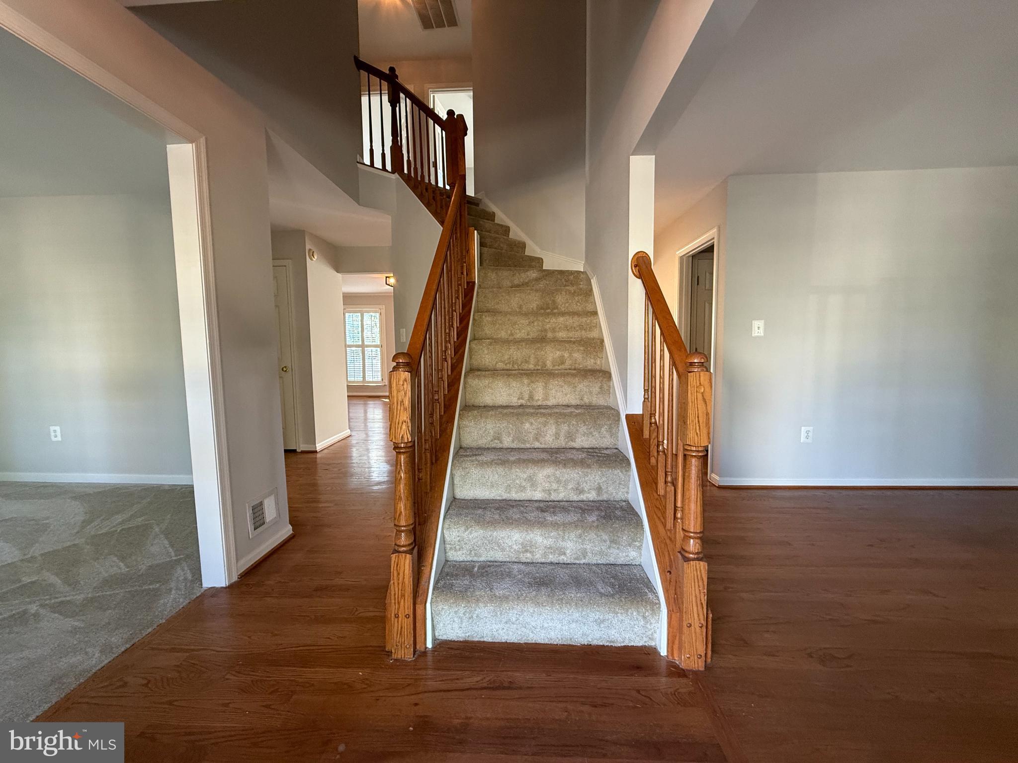 20453 Charter Oak Drive Ashburn, VA 20147 - Photo 15 of 31 a view of entryway and hall with wooden floor