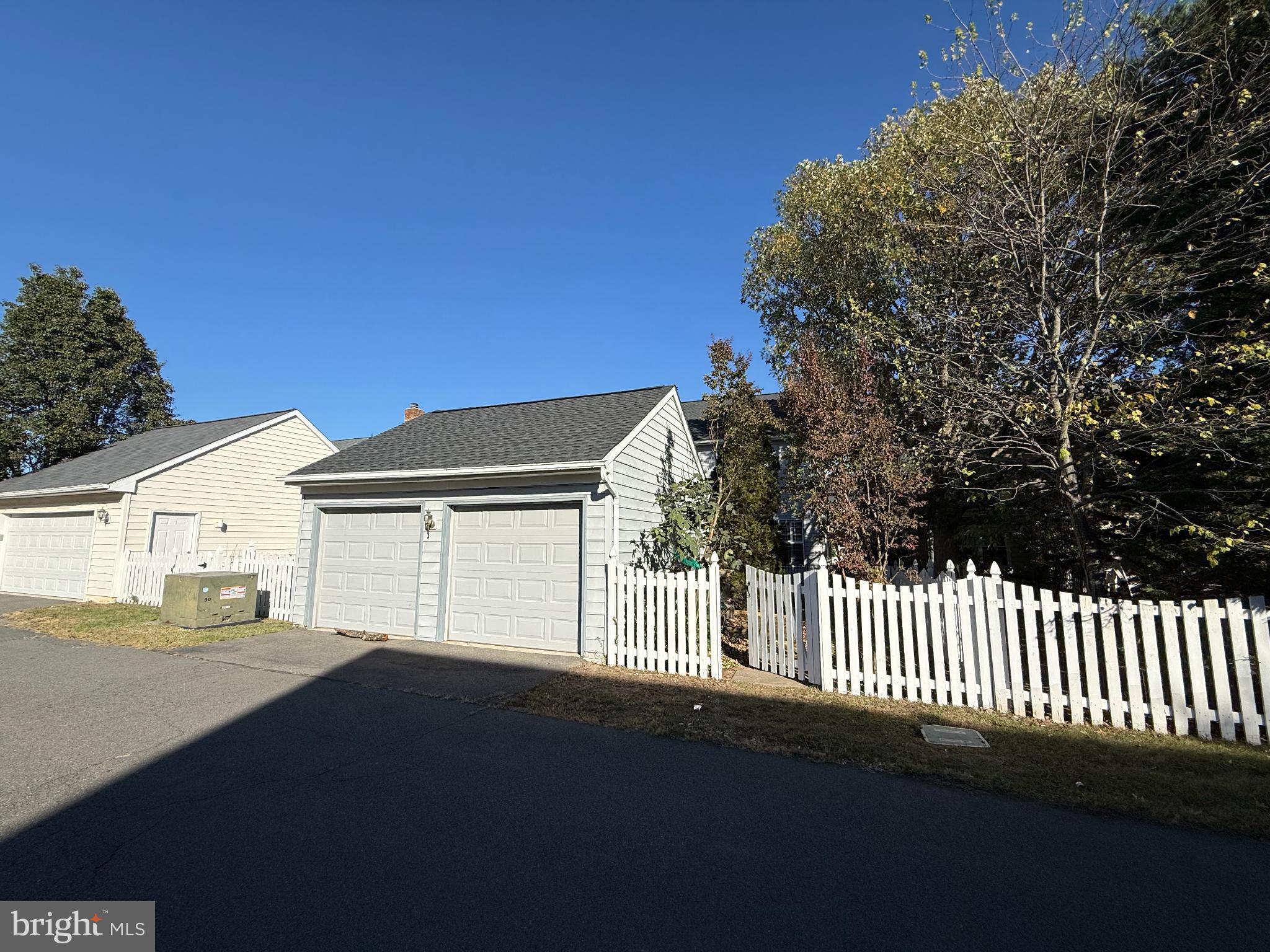 20453 Charter Oak Drive Ashburn, VA 20147 - Photo 18 of 31 a front view of a house with a yard