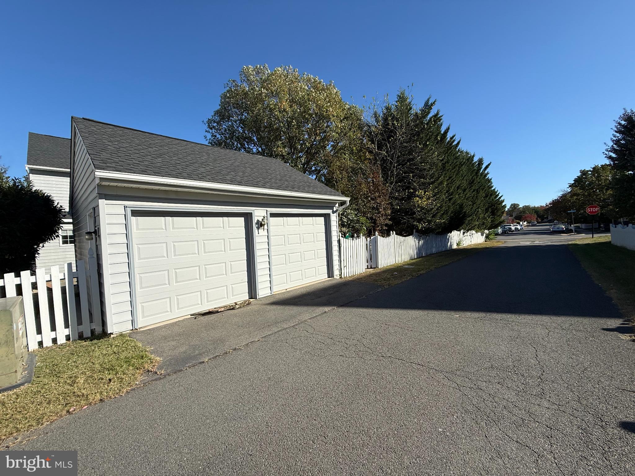 20453 Charter Oak Drive Ashburn, VA 20147 - Photo 19 of 31 a view of backyard and garage