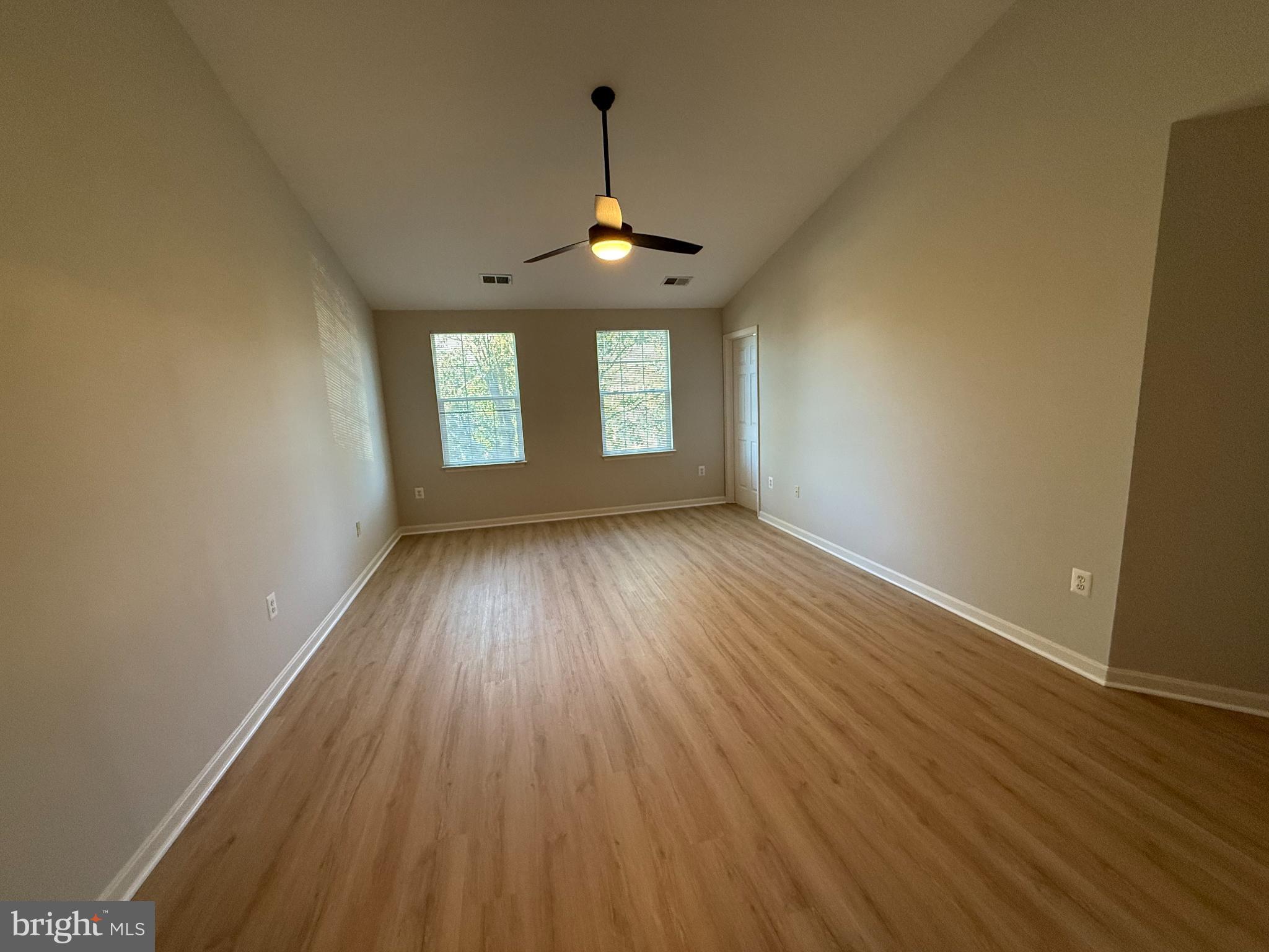 20453 Charter Oak Drive Ashburn, VA 20147 - Photo 27 of 31 wooden floor in an empty room with a window