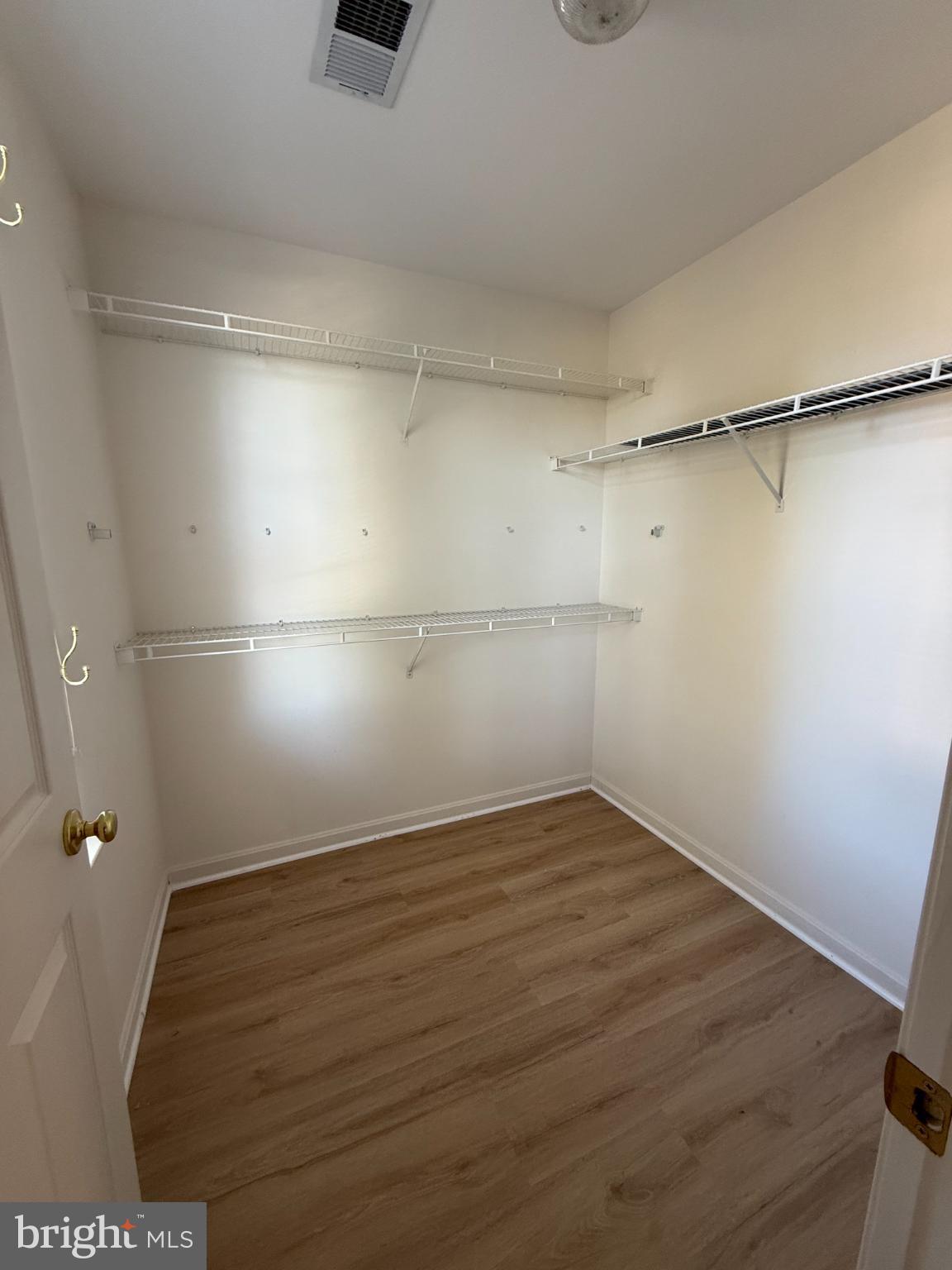 20453 Charter Oak Drive Ashburn, VA 20147 - Photo 28 of 31 a view of an empty walk in closet