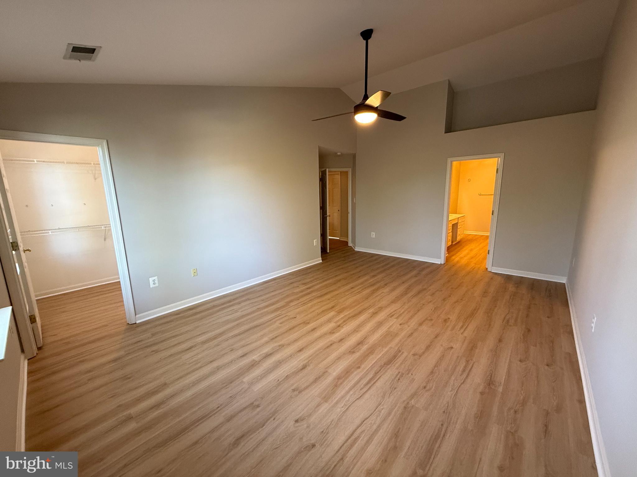 20453 Charter Oak Drive Ashburn, VA 20147 - Photo 7 of 31 wooden floor in an empty room with a window