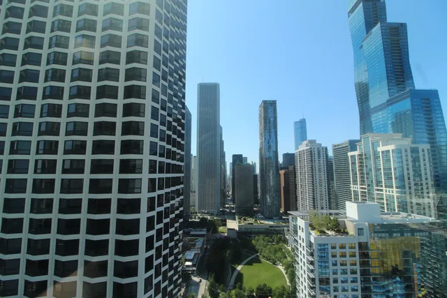 a view of a city with tall buildings