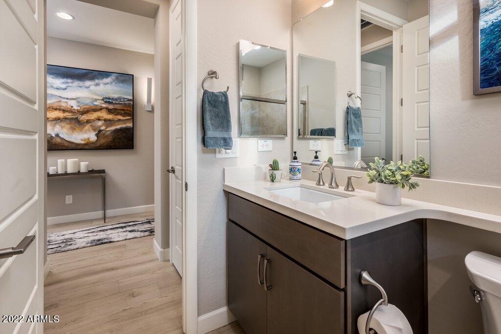 17860 East Cindercone Road Rio Verde, AZ 85263 - Photo 24 of 60 a bathroom with a sink and a mirror