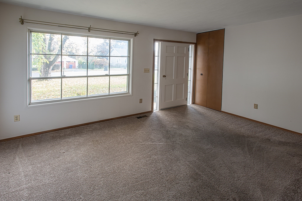 21 Dwight Street Hatfield, MA 01038 - Photo 11 of 24 an empty room with a empty space and windows
