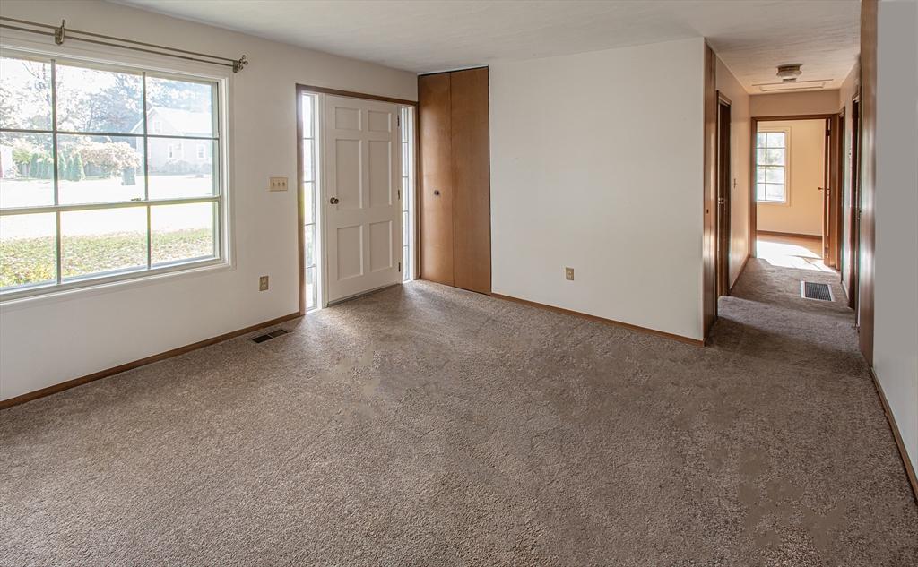 21 Dwight Street Hatfield, MA 01038 - Photo 12 of 24 an empty room with windows and closet
