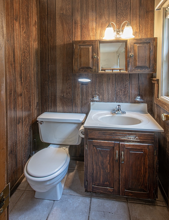21 Dwight Street Hatfield, MA 01038 - Photo 13 of 24 a bathroom with a toilet a sink and a window