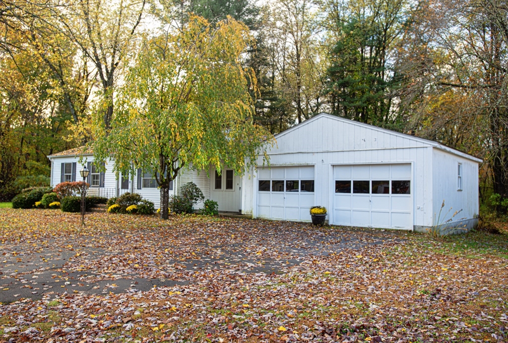 21 Dwight Street Hatfield, MA 01038 - Photo 3 of 24 a front view of a house with a yard