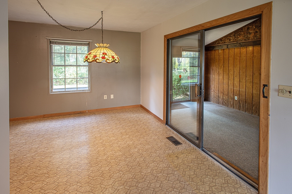 21 Dwight Street Hatfield, MA 01038 - Photo 8 of 24 an empty room with windows and outdoor view