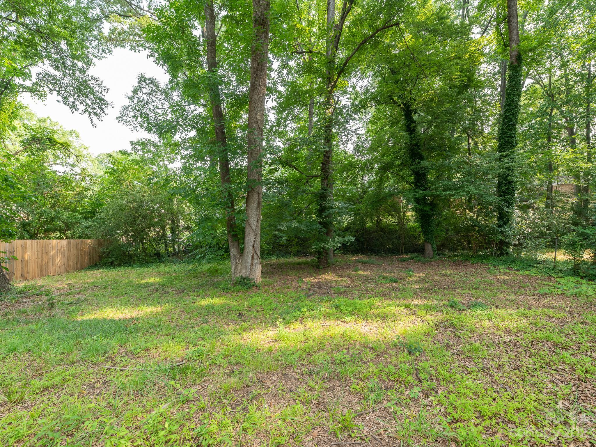 2824 Fordwood Drive Charlotte, NC 28208 - Photo 21 of 33 a view of a yard with a trees