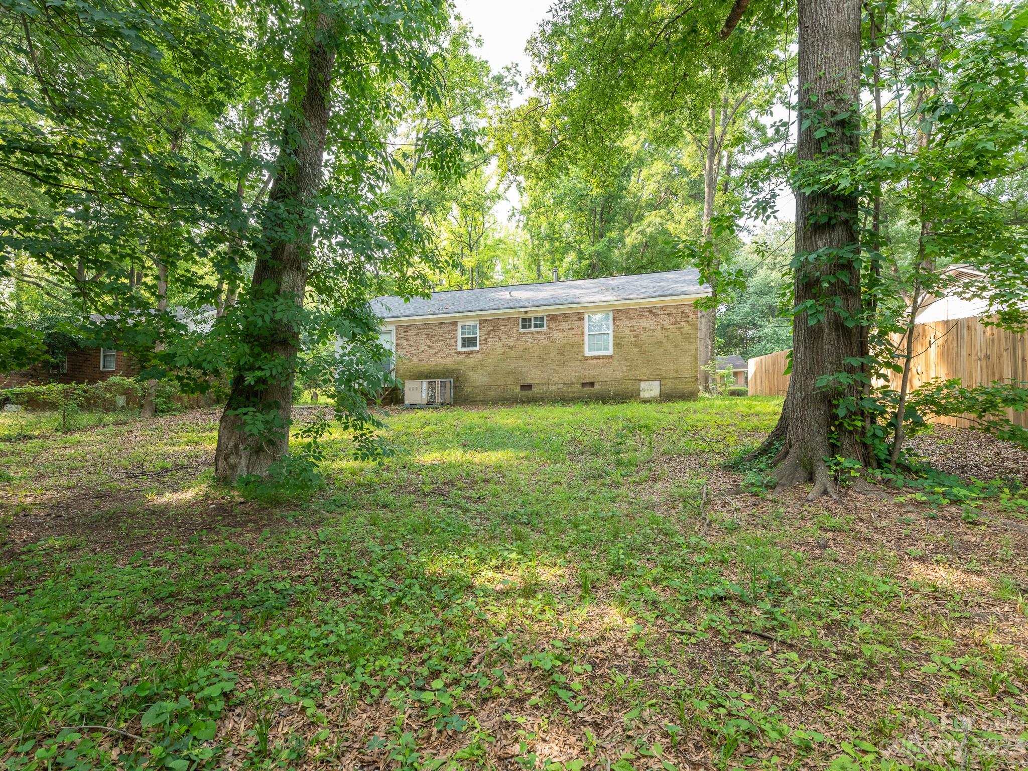 2824 Fordwood Drive Charlotte, NC 28208 - Photo 23 of 33 a view of a house with a yard