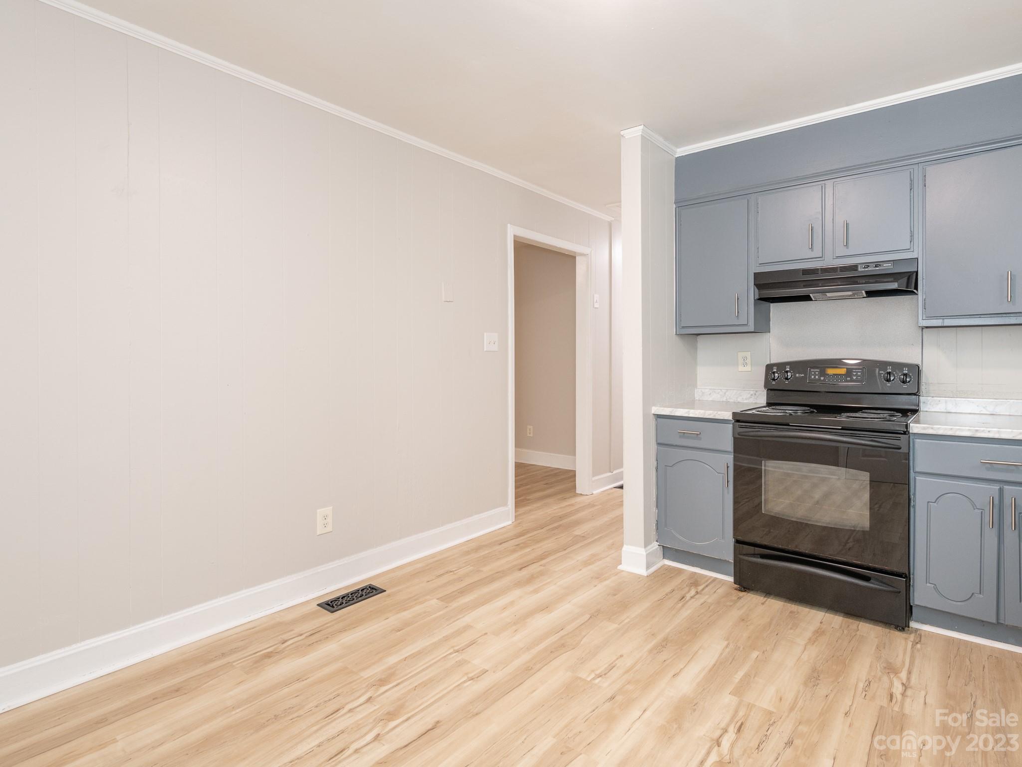 2824 Fordwood Drive Charlotte, NC 28208 - Photo 26 of 33 a kitchen with a sink and a stove top oven