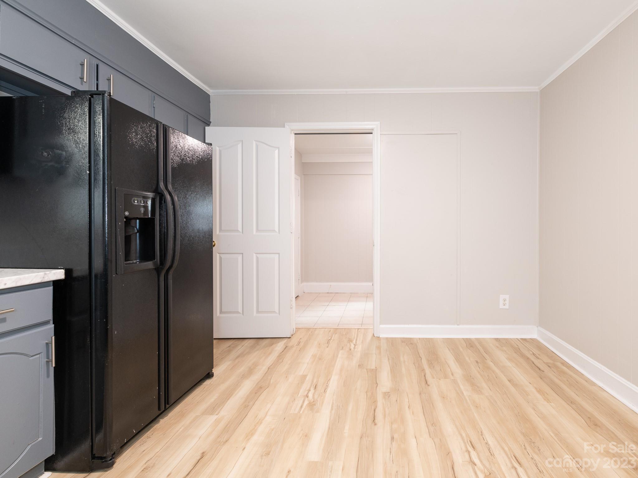 2824 Fordwood Drive Charlotte, NC 28208 - Photo 30 of 33 a view of empty room with wooden floor