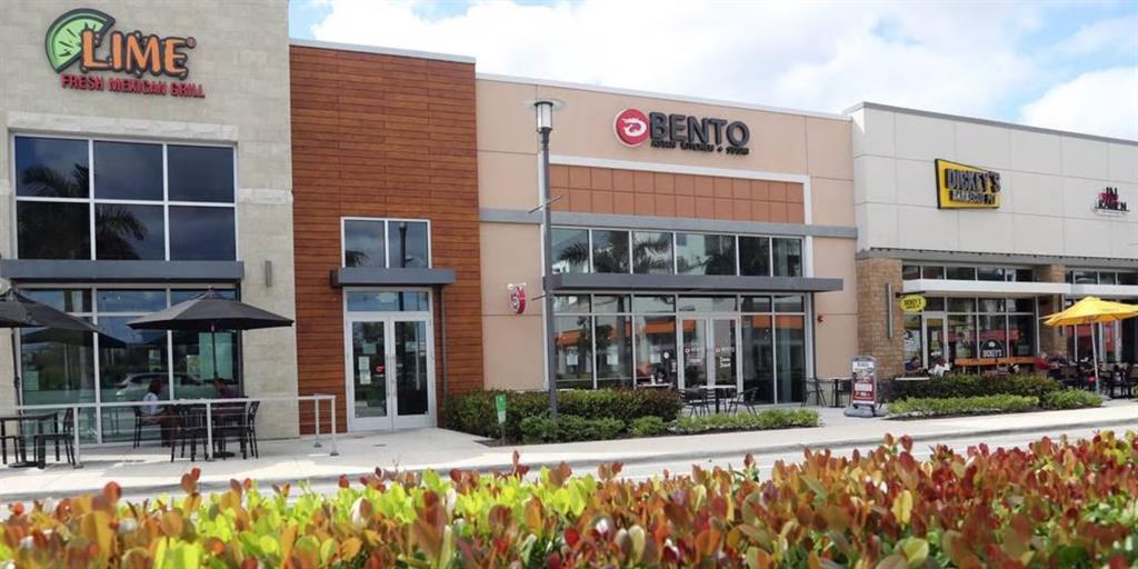 120 North Compass Way, Unit 230 Dania Beach, FL 33004 - Photo 40 of 42 a view of a building with a outdoor space