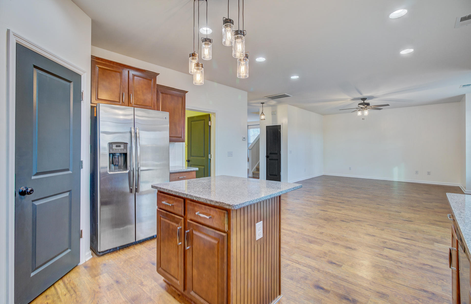 2034 Triple Crown Lane Ridgeville, SC 29472 - Photo 11 of 35 Kitchen into Family Room