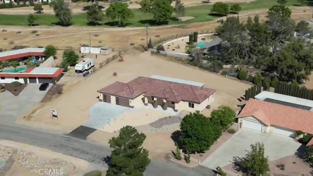 14785 Tigertail Road Apple Valley, CA 92307 - Photo 19 of 20 an aerial view of multiple houses with yard