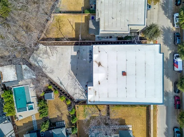 a view of a porch with a wooden fence