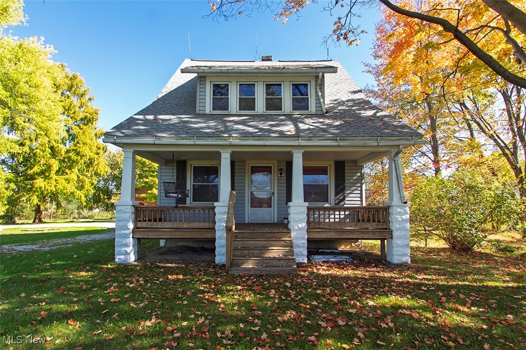 3555 Marks Road Medina, OH 44256 - Photo 1 of 19 Bungalow-style house with a porch and a front yard