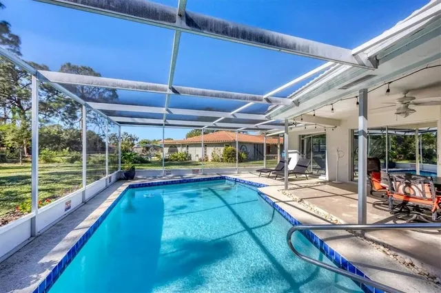 a view of a park with large trees