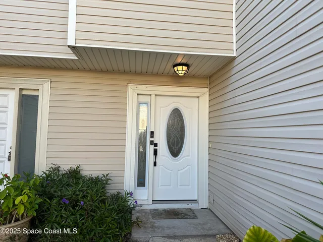 a front view of a house with entryway