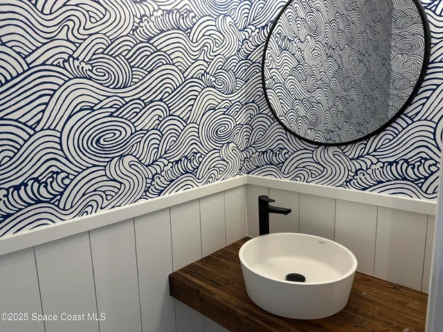 a bathroom with a toilet and a sink