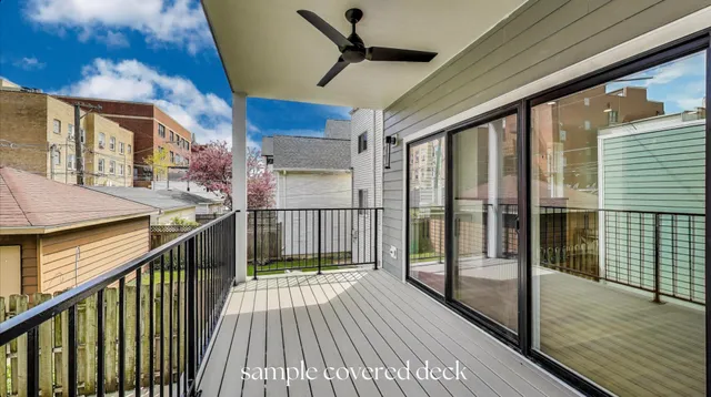 a view of a balcony with wooden floor