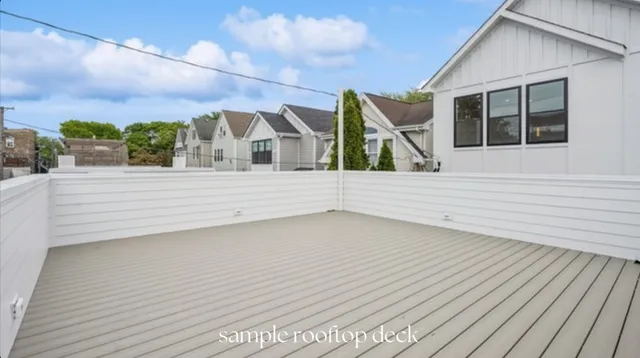 a view of an house with roof deck