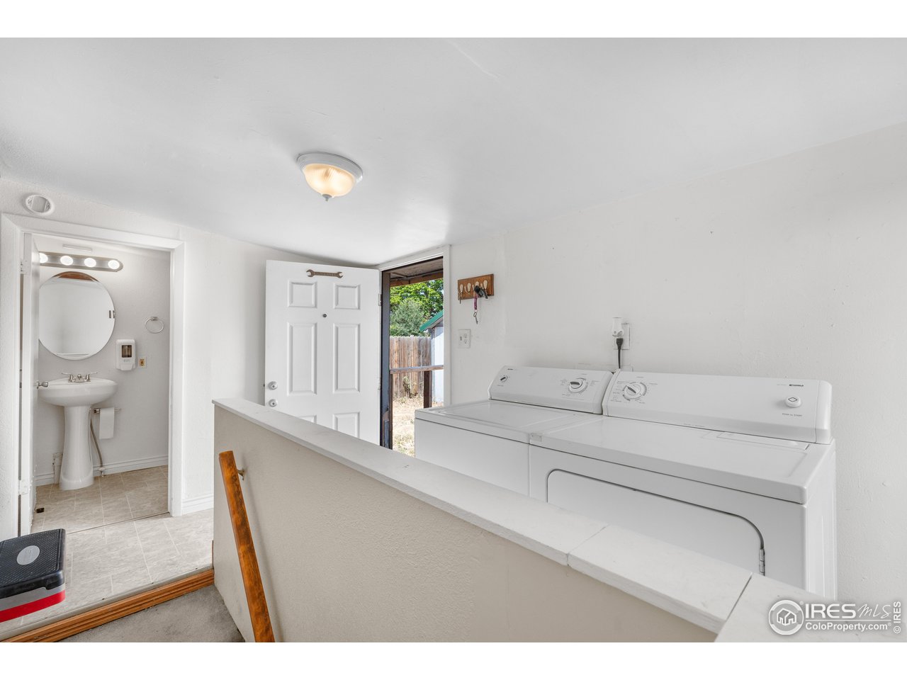 2706 7th Avenue Garden City, CO 80631 - Photo 20 of 47 a en suite bathroom with a sink and a toilet