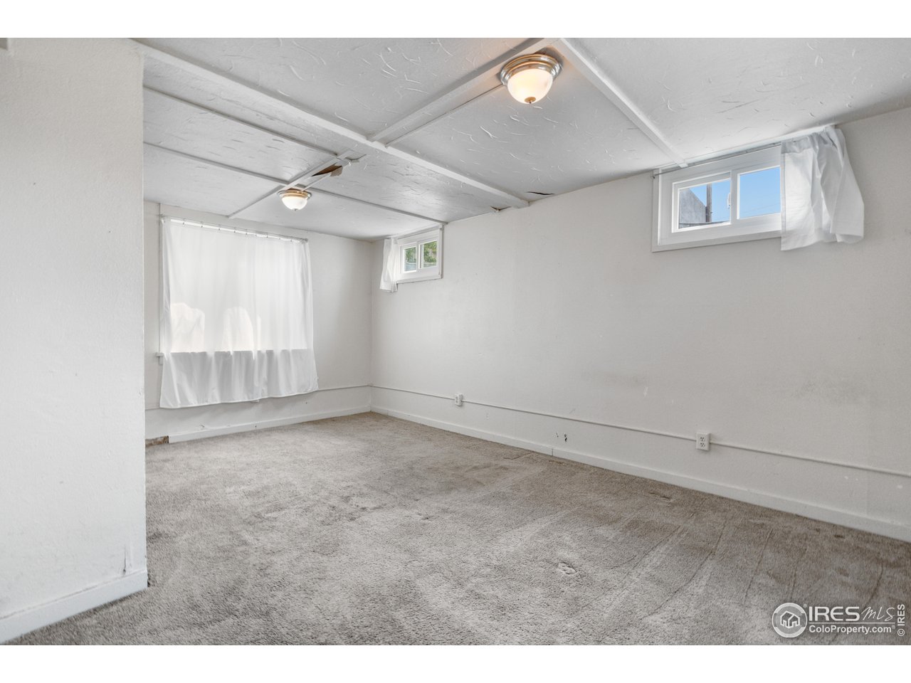 2706 7th Avenue Garden City, CO 80631 - Photo 27 of 47 a view of an empty room with a window